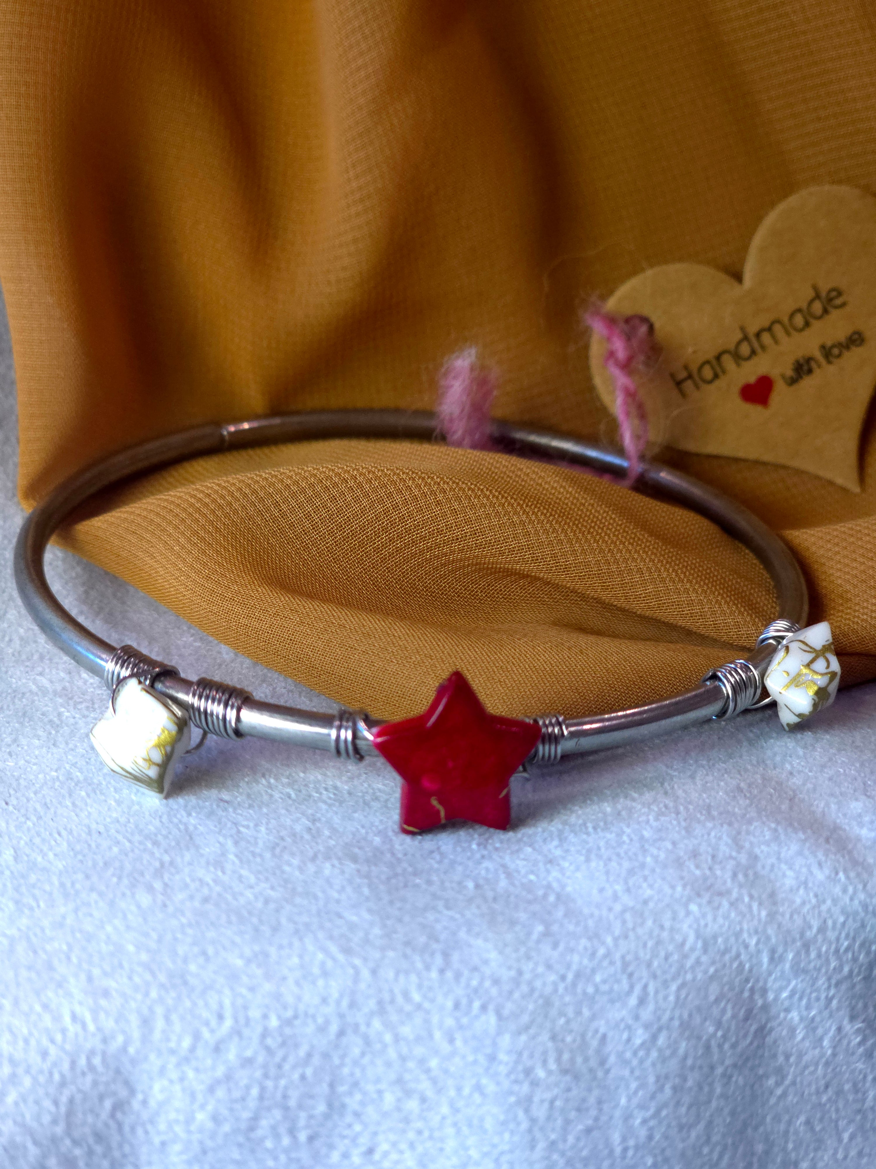 Handmade bangle bracelet with red star