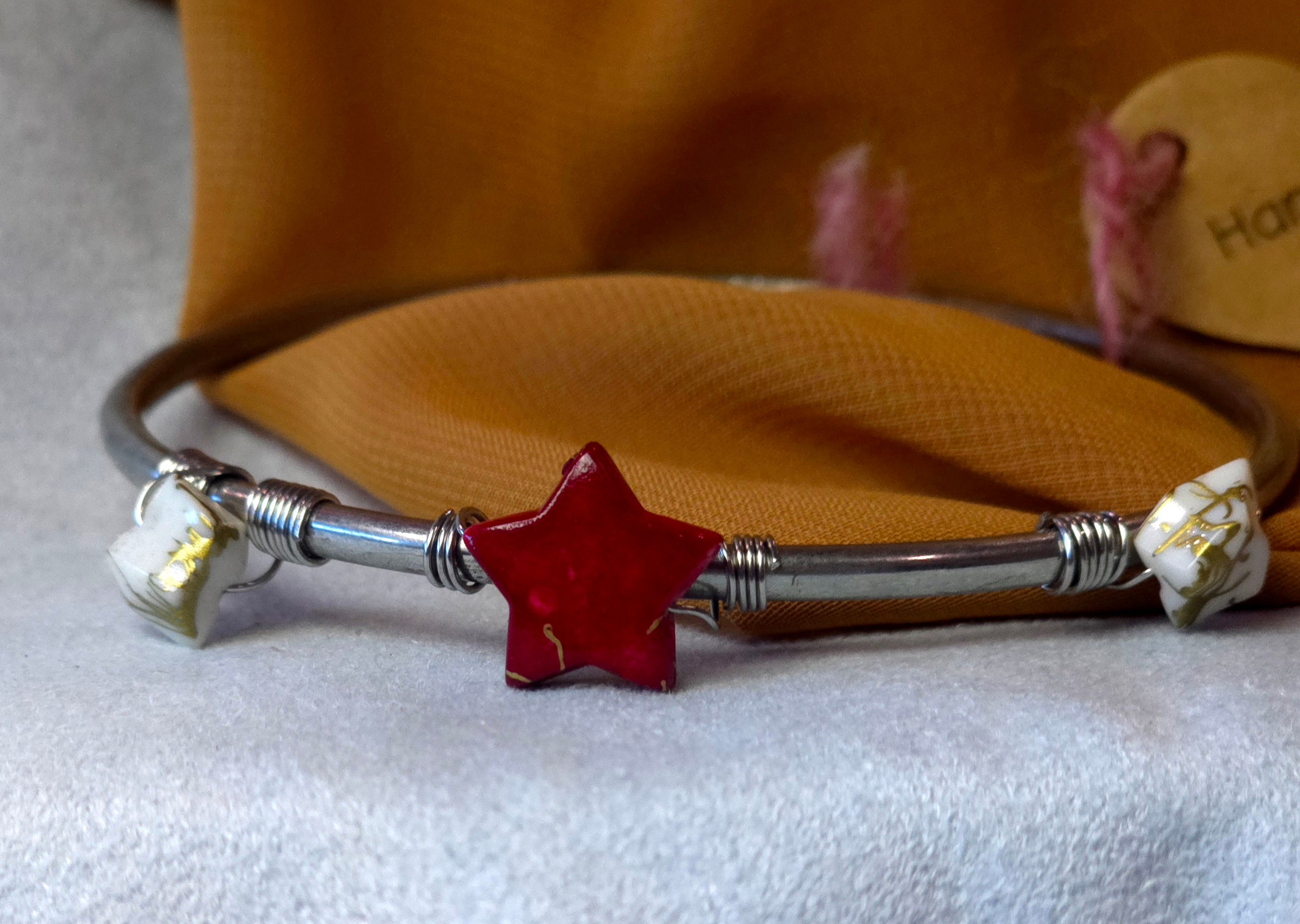 Handmade bangle bracelet with red star