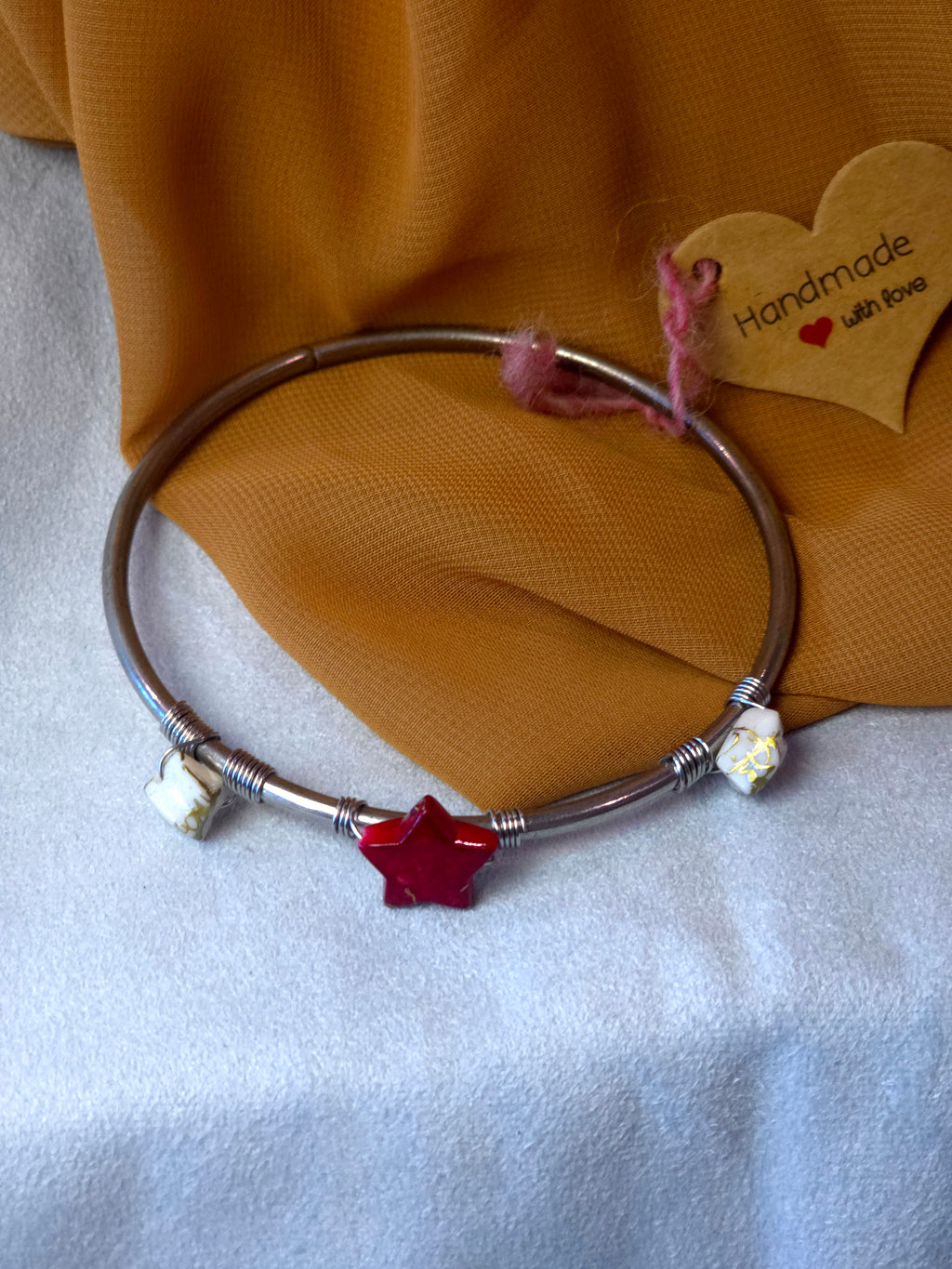 Handmade bangle bracelet with red star
