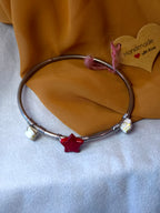 Handmade bangle bracelet with red star