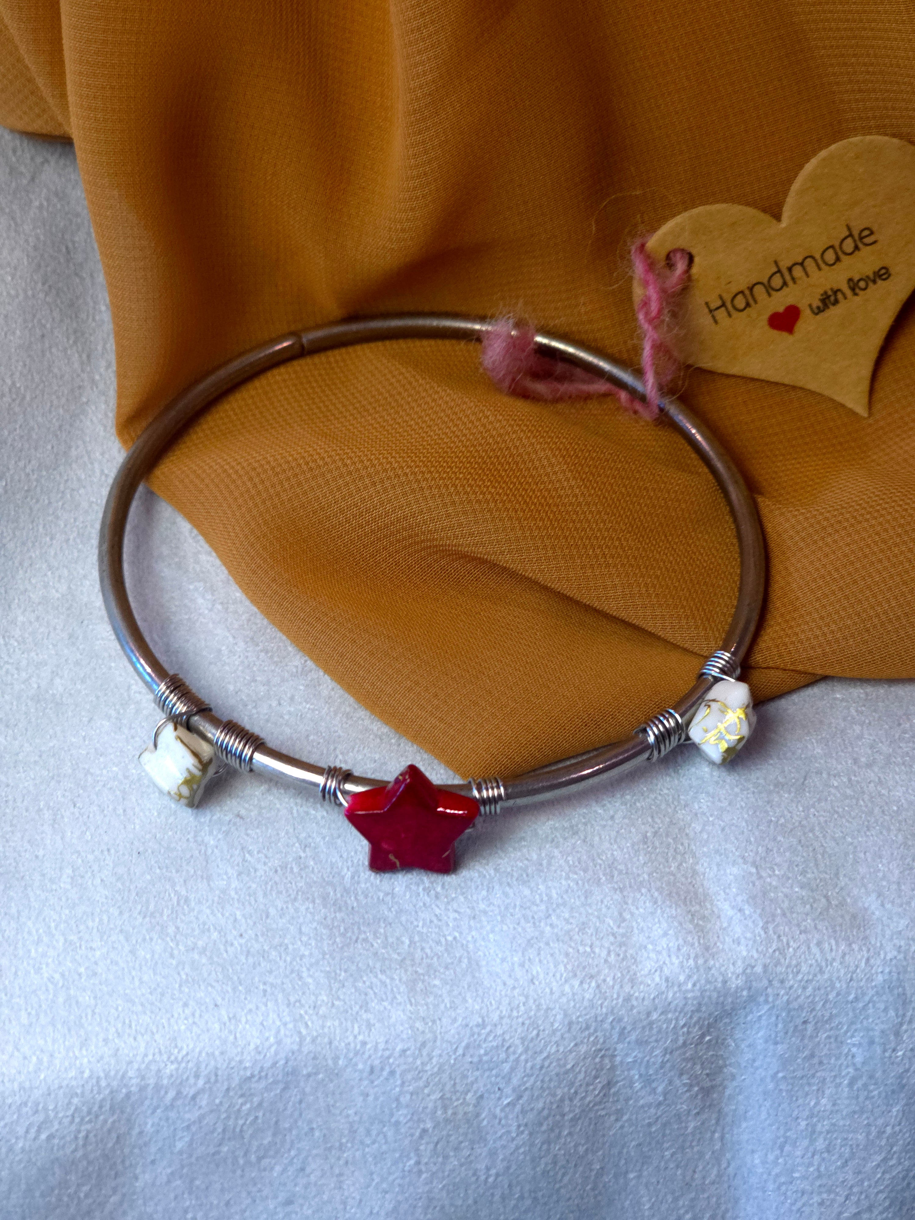 Handmade bangle bracelet with red star