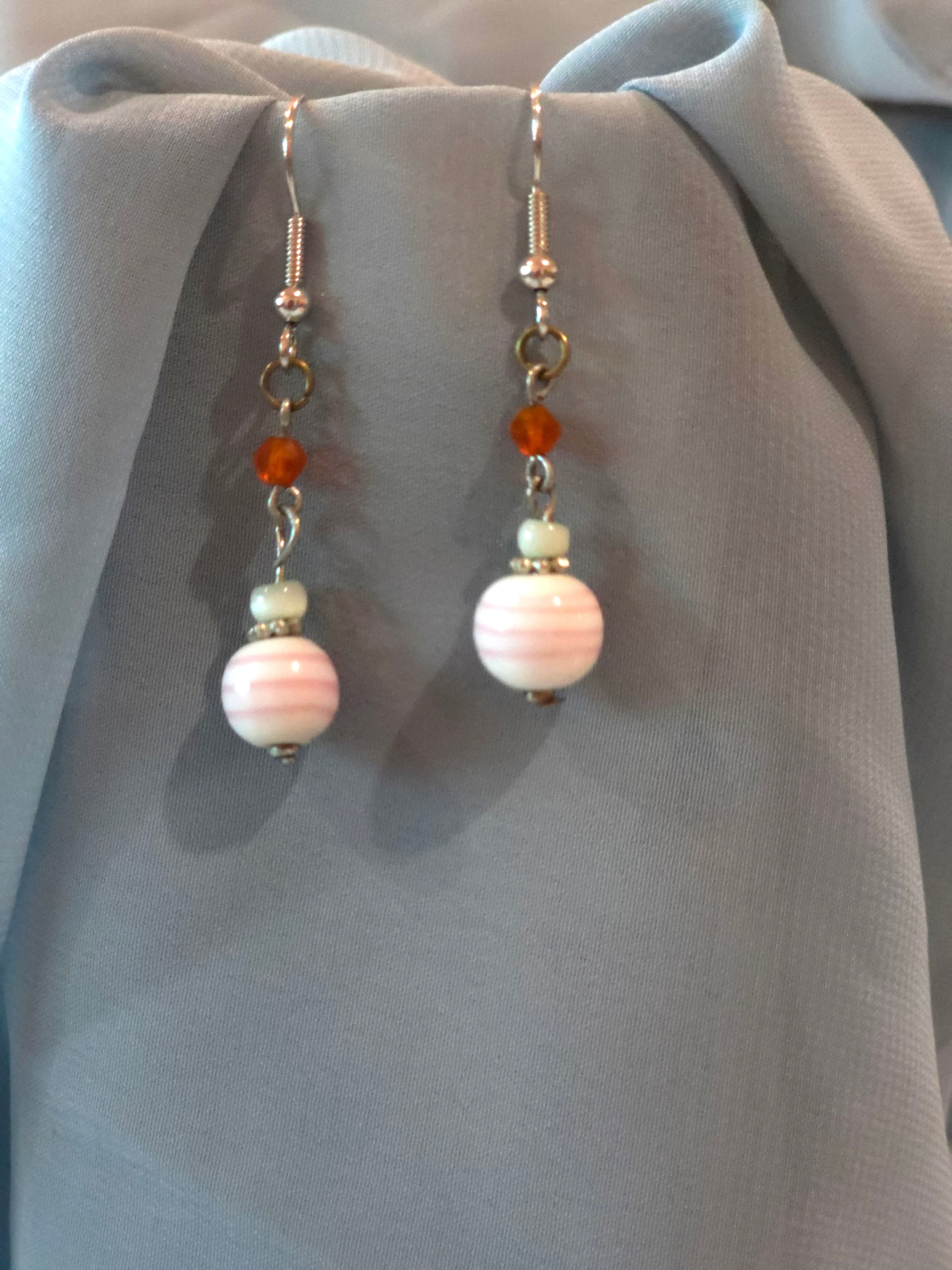Pink and white dangle earrings