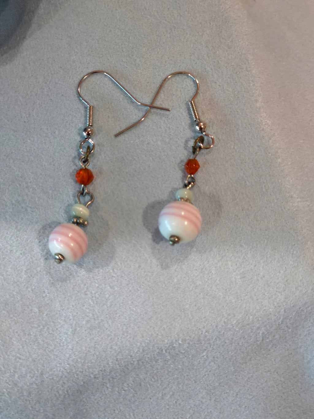 Pink and white dangle earrings